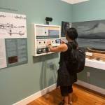 A visitor learns about the Lutshootseed language at the Vashon Heritage Museum. (Courtesy photo)