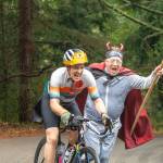 Jim Marsh chases a rider during the Passport2Pain bike ride on Saturday, September 14. (Alex Bruell photo)