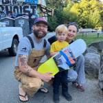 Wolf Blohowiak, the winner of the two-year-old timed trial event, was awarded his first skateboard at BARCs Pump the Bump. Wolf is shown here with his parents, Dan and Chelsea Blohowiak. (Courtesy photo)