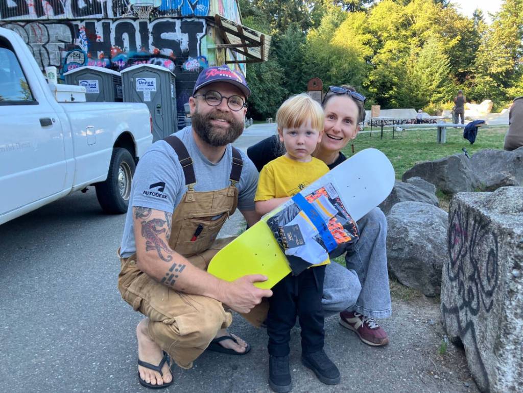 Wolf Blohowiak, the winner of the two-year-old timed trial event, was awarded his first skateboard at BARCs Pump the Bump. Wolf is shown here with his parents, Dan and Chelsea Blohowiak. (Courtesy photo)