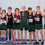 The Vashon High School Cross Country boys stand at the podium celebrating their third place win. (John Decker photo)