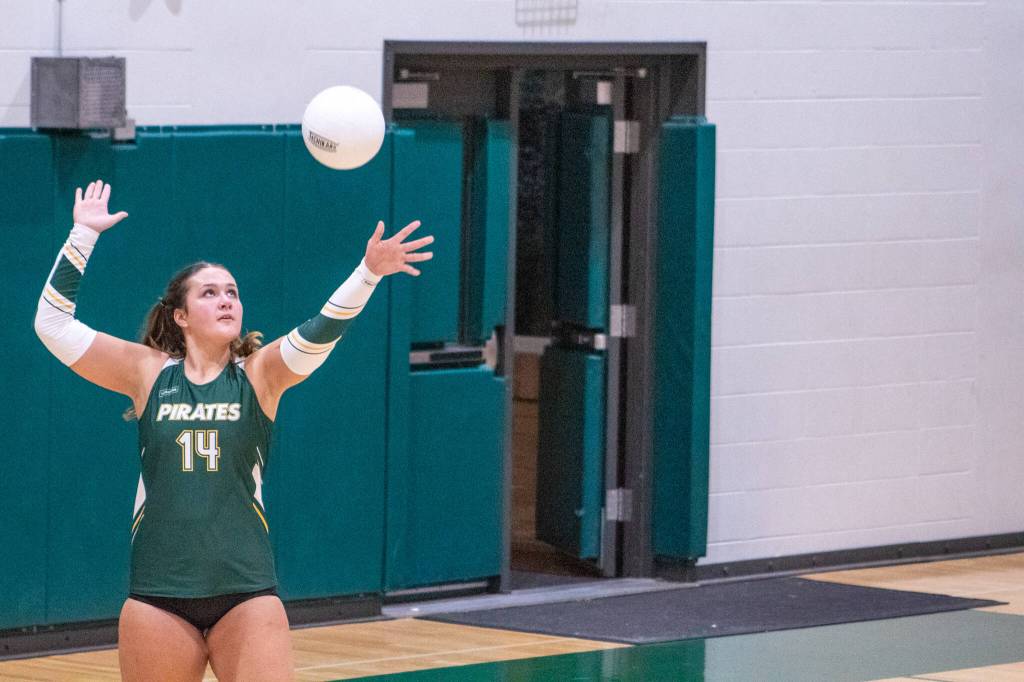 Varsity Senior middle hitter #14 Mylie Limont competes against East Jefferson High School at Vashon on September 25. (Alex Bruell photo)