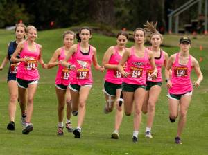 The girls of the Vashon High School Cross Country team kick off their race at Camas Prairie Golf Park in Port Townsend on Tuesday, September 17. (John Decker photo)