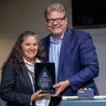 Esther Lucero (Diné), president and CEO of the Seattle Indian Health Board, is presented with the 2024 King County Recovery Champion Award on Sept 24. Councilmember Reagan Dunn presented the award. (Photo by Thomas Hawthorne, King County)