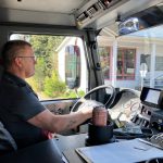 Larry Elliott, the service manager for Hughes Fire Equipment, in Tacoma, was behind the wheel as the new fire engine made its way north on Vashon Highway toward its new home  Vashon Island Fire & Rescues Station 55, on Bank Road. (Elizabeth Shepherd photo)