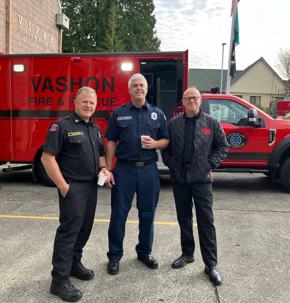 (Left to right) Division Chief Ben Davidson, Captain Josh Munger, and Fire Chief Matt Vinci, at the fire districts open house. (Elizabeth Shepherd photo)