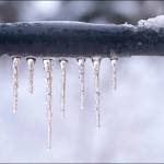 The bulge in this pipe means the water has frozen, expanding to the point that it has burst the pipe. The result has been a leak that could flood a house.