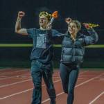 Junior Class homecoming court honorees Oskar Cobb-Maigetter and Cecilia Guenther finished their honorary halftime lap on their feet. (Alex Bruell photo)