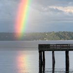 Ray Pforners photo of a rainbow over Tramp Harbor. Pfortner will lead a workshop at Vashon Library on Nov. 16, to discuss participants photograghs of water scenes. (Ray Pfortner photo)
