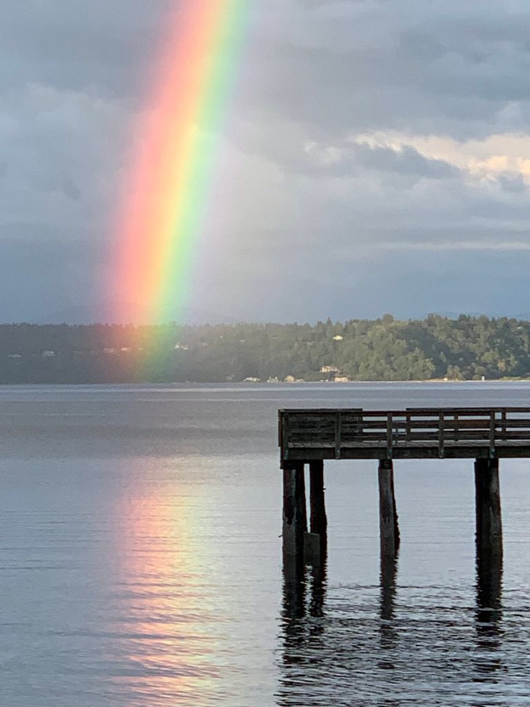 Ray Pforners photo of a rainbow over Tramp Harbor. Pfortner will lead a workshop at Vashon Library on Nov. 16, to discuss participants photograghs of water scenes. (Ray Pfortner photo)