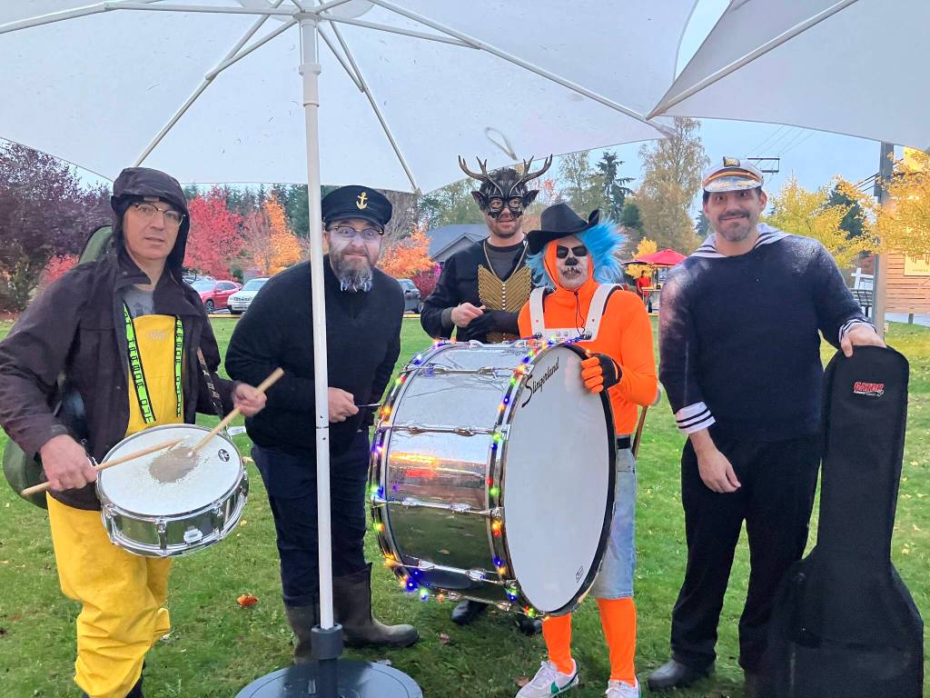 Members of the islands own VasHonk community band showed up ready to make a joyfully spooky noise in the night. (Elizabeth Shepherd photo)