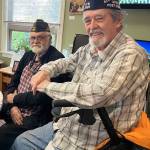 Vashon veterans Mike Mattingly and Roy Bumgarner, enjoying lunch at the Senior Center. (Elizabeth Shepherd photo)