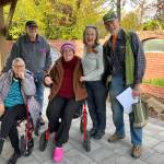 (Left to right) Wanda Fullner, Bruce Haulman, Lee Green, Maria Glanz, and Bill Swartz, in Vashon Senior Centers World War II Memorial Garden on Nov. 8. (Elizabeth Shepherd photo)