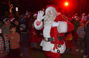 Santa waves to the camera on Vashon Highway SW. Jim Diers photo