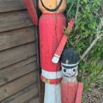 Four wooden soldier sculptures were dropped off by an anonymous donor at Santas cottage this year. Now, theyve been restored and will be on display in the window of U.S. Bank. (Courtesy photo)