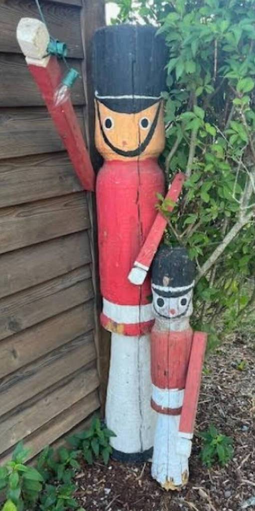 Four wooden soldier sculptures were dropped off by an anonymous donor at Santas cottage this year. Now, theyve been restored and will be on display in the window of U.S. Bank. (Courtesy photo)