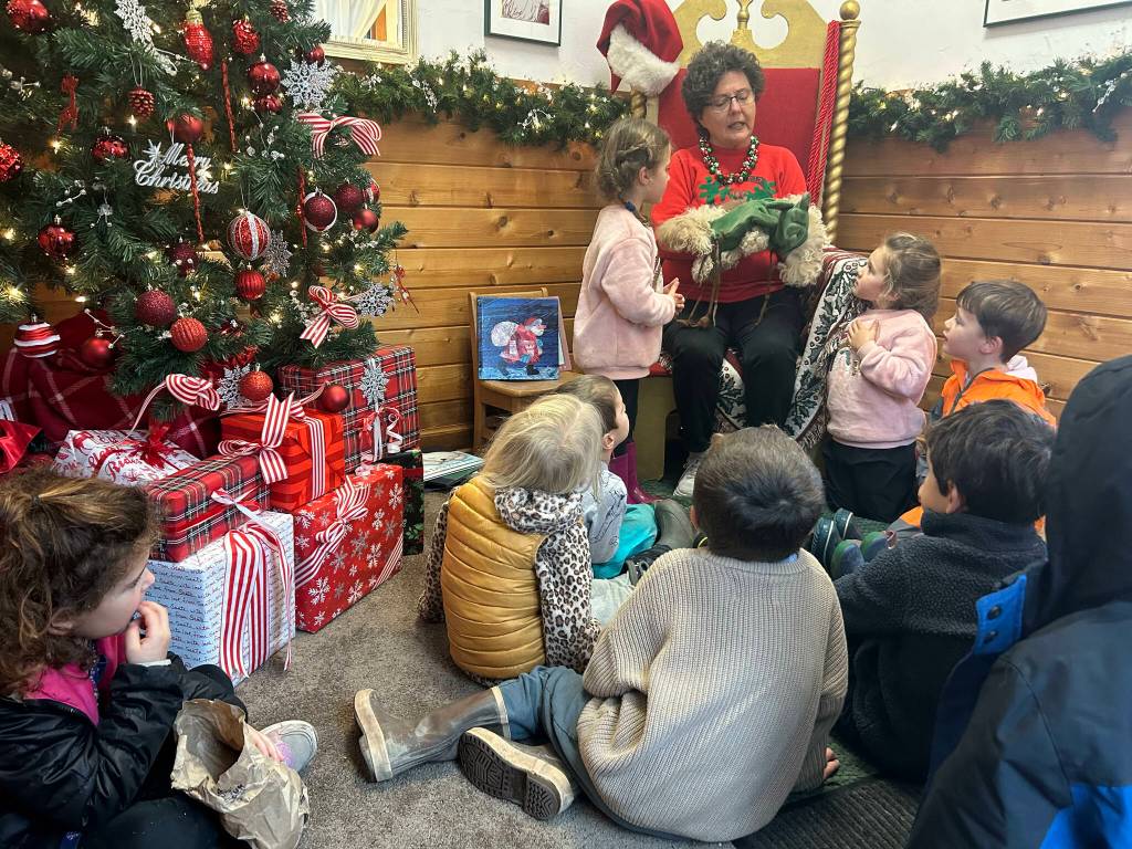 Bettie Edwards, with preschoolers at Santas Cottage. (Courtesy photo)