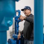 Armin Wahanik, operator in responsible charge at Water District 19, gives a tour of the districts treatment plant. (Alex Bruell photo)