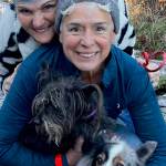 Susan (foreground) and Colleen Carette, with Bravery (black dog) and Daisy, just after Daisy led Bravery out of a steep forest ravine. Courtesy photo.