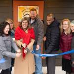 The ribbon is cut at Island Center Homes by, from left to right: Kelly Rider, director of the King County Department of Community and Human Services; Judy Tucker, owner of Form + Function Architecture; Kari Dohn Decker, interim executive director of Vashon HouseHold; Alex Crowder, CEO of Crowder Construction; Chris Lovings, community engagement specialist at the Washington State Department of Commerce; Rachel Hetrick, housing stewardship manager at Vashon HouseHold; and Shelly Whitlock, property manager at Vashon HouseHold. (John Decker photo)