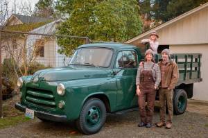 2024 Terry Donnelly Photograph. 
Lisa Hasselman, Chris Hedgpeth, and their daughter Loretta with Tashio’s truck.