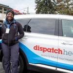 EMT Bailey Black and nurse practitioner Christian Graves stand next to their DispatchHealth van in Vashon. (Alex Bruell file photo)
