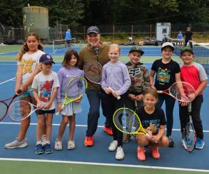 Courtesy photo
Coach Geoff Garza stands with the young athletes of the Vashon Island Golf and Country Club. Garza recently relocated to Vashon Island, where he is now the head pro at the club.