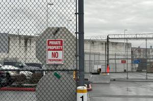 A no trespassing sign outside of the Northwest ICE Processing Center in Tacoma. (Grace Deng/Washington State Standard)