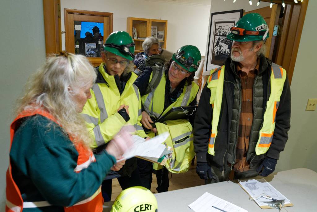 After teams of CERT volunteers noted the status of critical locations all over the island, the teams reported back to their leads at the EOC. (Rick Wallace photo)