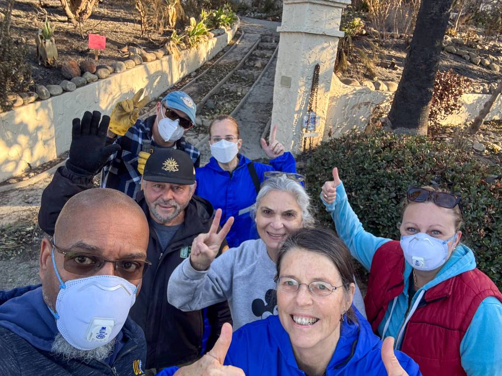 Vicky Seewaldt (front, right) with her cleanup and salvage crew at her Altadena home after the fire. (Courtesy photo)