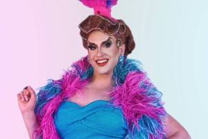 Courtesy photo
Hostess and chanteuse Louvel returns this year to host the Vashon Senior Center’s Rainbow BLINGO Spring Fling.