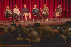 From left to right: Vashon HouseHold Interim Executive Director Kari Dohn Decker, Kris Hermanns, a Seattle-based social impact and philanthropic strategist, Shelter America President Chris Bric, Sawbones HR Manager Kit Gruver, King County Council Member Teresa Mosqueda, and moderator Mary Bruno spoke to a crowd of nearly 100 people at Vashon Center for the Arts on March 18. (Alex Bruell photo)