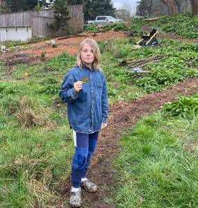 Courtesy photo
Maverick Wilkes, 11, holds a patch from the Nature Center after helping at the work party.