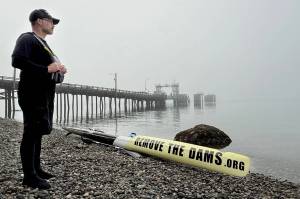 On the foggy morning of March 25, after an overnight stay on Vashon, Gabriel Newton continued on his journey to Olympia from the beach at Tahlequah. (Britt Freda photo)