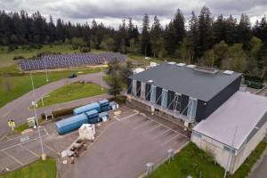 An aerial view of the Vashon Recycling and Transfer Station, with solar array in background. (Photo courtesy King County)