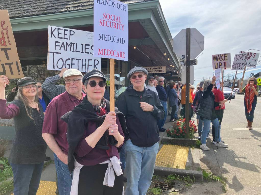 Elizabeth Shepherd Photo
More than 150 islanders showed up to Vashons Hands Off protest on Saturday with a variety of messages.