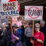 Kent Phelan photo
Signs at the protest included those reading MAKE GOOD TROUBLE and TYRANNY  the latter crossed out.