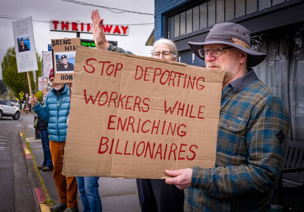 Demonstrators returned to the islands four-way stop last weekend to protest actions by the Trump administration. (Kent Phelan photo)