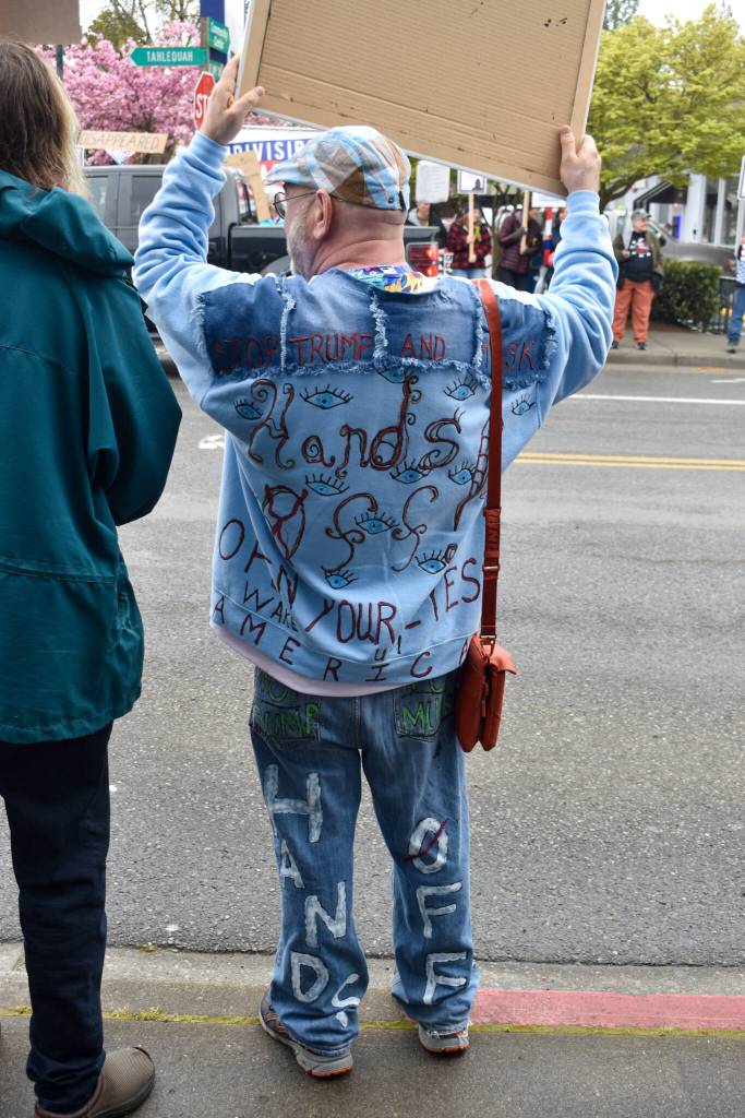 Island artist Matt Beurskens outfit criticized Donald Trump and Elon Musk at the April 19 protest. (Alex Bruell photo)