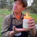 James Cottrell holds a venison tallow candle made from rendered deer fat. (Courtesy photo)