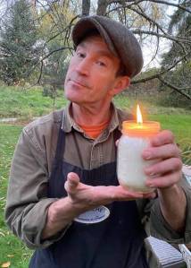 James Cottrell holds a venison tallow candle made from rendered deer fat. (Courtesy photo)