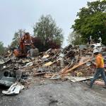 Workers continued to demolish Vashons Spinnaker Building on Tuesday, April 29. (Tom Hughes photo)