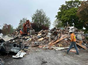 Workers continued to demolish Vashons Spinnaker Building on Tuesday, April 29. (Tom Hughes photo)
