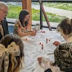 The cast of "Reunited with the Heart Surgeon" working with their director, Andy James, on their script for one part of their show. (Photo courtesy of Maarten Ribalet-Coesel)