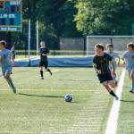 Vashons Lewis Thompson fights to keep the ball from Cascade Christian. (Dawn Stief photo)