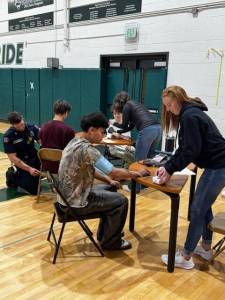 School staff and volunteers screened 38 Vashon High School students as part of an inaugural student cardiac screening by the Sam Yates Community Foundation on May 20. (Courtesy photo)
