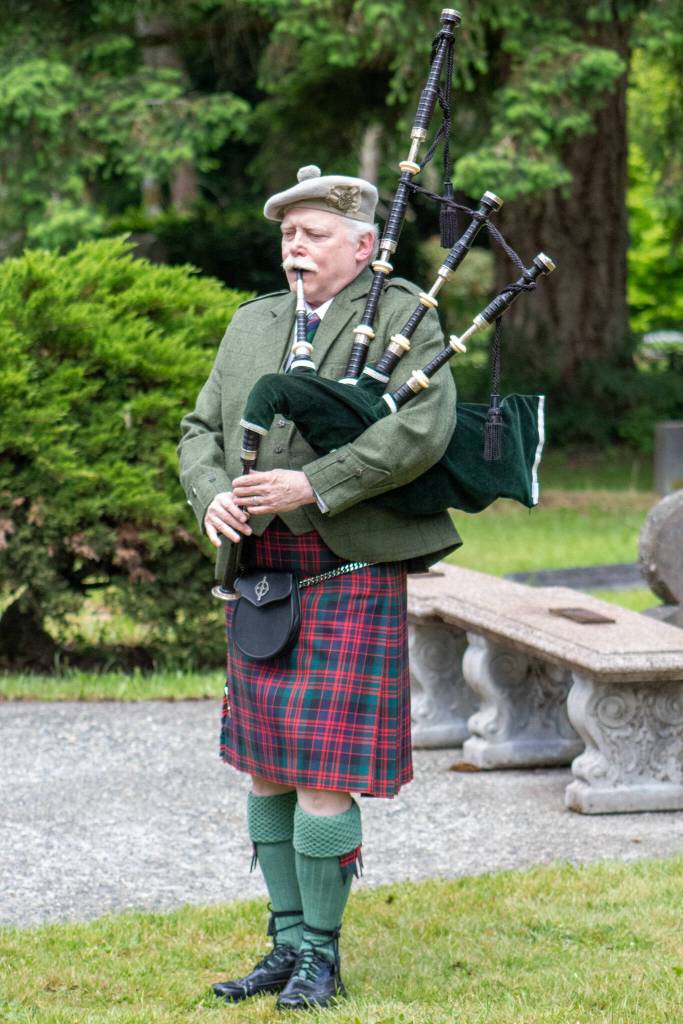 Bagpiper John Dally performed at both ceremonies over the weekend. (Alex Bruell photo)