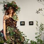 A foliage-filled garden installation by John Coghlan is graced by Fernadette, created by Emily Burns, Aimee Demarest and Melissa Feveyear, in VCAs exhibition of garden art. (Courtesy photo)