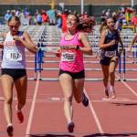Vashons Lena Puz sprinted from the shot pit to the start of the 100 meter hurdles, where she set a school record and earned a second place finish at state. (Tony Puz photo)