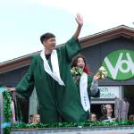 Twin graduates Jamie and Sadie Choo were among those cheered during the 2024 Vashon High School graduation parade. This year, the parade rolls through town from noon to 1 p.m. on Saturday, June 14. (Elizabeth Shepherd file photo)